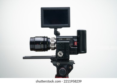 8k Digital Cinema Camera On A Tripod With A 75mm F2.8 Prime Cine Lens Compact White Background