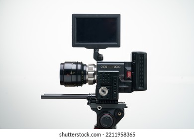8k Digital Cinema Camera On A Tripod With A 32mm F2.8 Prime Cine Lens Compact White Background