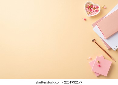 8-march concept. Top view photo of stack of notepads golden pen heart shaped saucer pushpins and sticky note paper on isolated pastel beige background with copyspace - Powered by Shutterstock