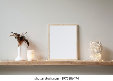 8x10 small, thin wood, vertical frame mockup for art and quotes. Bohemian style props on a light wooden shelf.