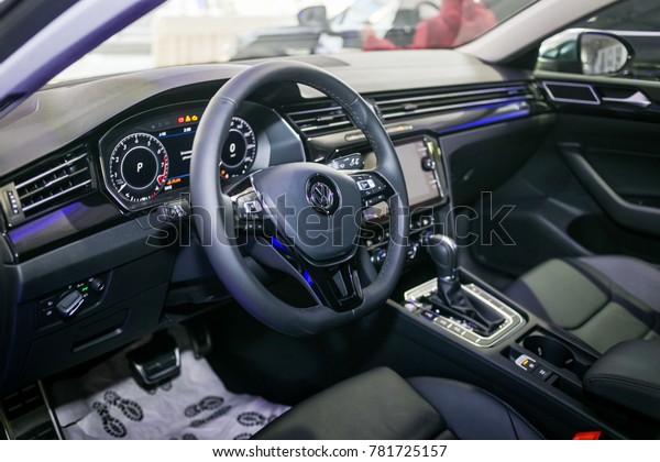 9 of\
December, 2017 - Vinnitsa, Ukraine. Black Volkswagen VW Arteon\
presentation in showroom - interior of the\
car