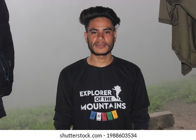 9 June 2021, Bedini Bugyal, Chamoli, Uttarakhand, India.an Indian Himalayan Trek Guide  Posing For A Photo During A Tour In Himalaya.