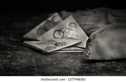 9 May, Victory Day holiday background. military cap, soldier's war letter. traditional symbol of Victory Day 1945. black and white tone. Day of Remembrance and Mourning, 22 june