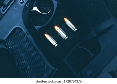 
9 mm ammunition on a black background