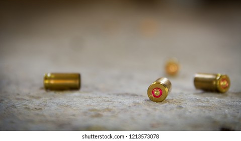 9 Mm Bullet Shells. It's Lying On The Ground