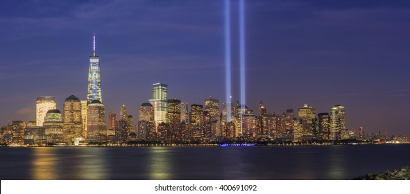 911 Memorial light and New York City skyline at night