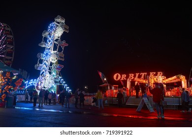 9-2-17 Syracuse Ny: People Wander Around The Midway At The Great New York State Fair At Night. 