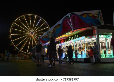 9-2-17 Syracuse Ny: People Wander Around The Midway At The Great New York State Fair At Night. 