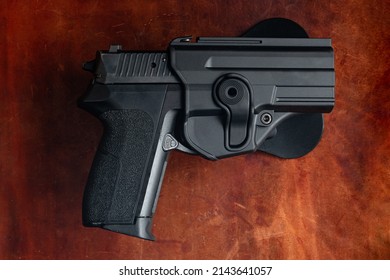 9mm Handgun On Leather In Holster