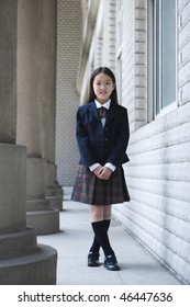 9-year Old Asian School Girl In School Uniform