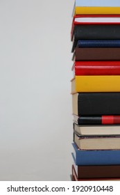 _Stack of books on white background
