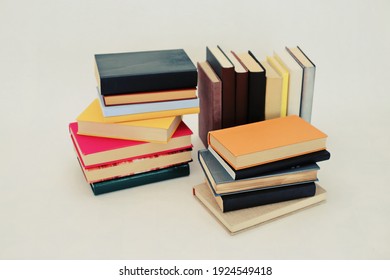 _Stack of books on white background - Shutterstock ID 1924549418