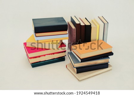 _Stack of books on white background