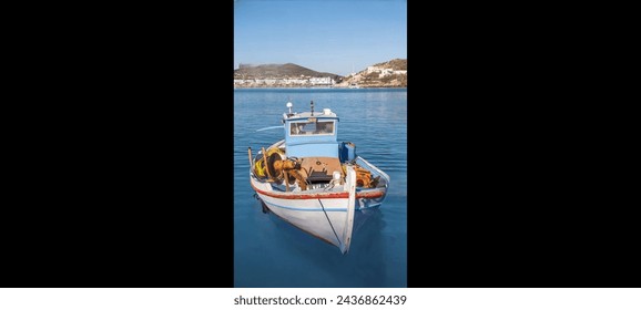 "A solitary boat bobs gently on the tranquil waters of the seaside, framed by the vast expanse of ocean and distant horizon. Against the backdrop of a serene sunset or a clear blue sky, - Powered by Shutterstock