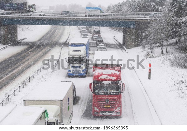 A1 Motorway, County Durham UK. Friday 8th January\
2021: People get out of their cars to see what is going on on the\
A1M Motorway in County Durham is currently gridlocked with traffic\
queuing for miles