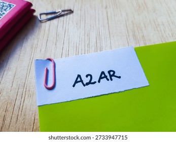 A2AR writting on table background. 