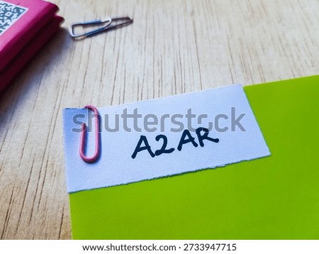A2AR writting on table background. 