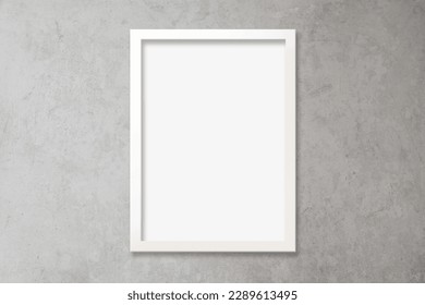 A4 white vertical frame with empty poster against a modern white brick background. Includes clipping path to make it easy to add your design to the frame.