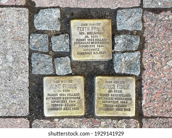 Aachen, Germany - 02-21-2021 - Stolpersteine (stumbling Blocks) Of Anne Frank And Family As A Reminder Of The Deportation By The Nazis In World War 2 In Front Of Her Former Home In Aachen, Germany.