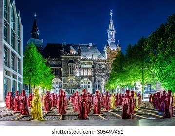 AACHEN, GERMANY, APRIL 11, 2014: People are admiring exhibition "Mein Karl" in german Aachen in front of local town hall.