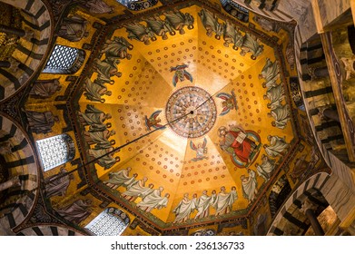 AACHEN, GERMANY - DECEMBER 6, 2013: Beautiful mosaics inside the octagon-shaped interior of the Aachen Cathedral.