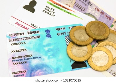 Aadhar Card And Pan Card Which Are Issued By Government Of India As An Identity Card With Indian Currency