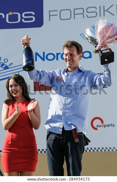 AARHUS, DENMARK - MAY 23 2015: His royal highness\
prince Joachim of Denmark at the Classic Race Aarhus 2015 - at the\
winners podium