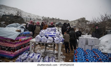 Aarsal, Beqaa Lebanon - 2 18 2021: Refugees in Refuge Camp in E'rsal Waiting for Donations Help at Syrian Lebanese Borders in Winter Snow Storm and Bad Weather Conditions