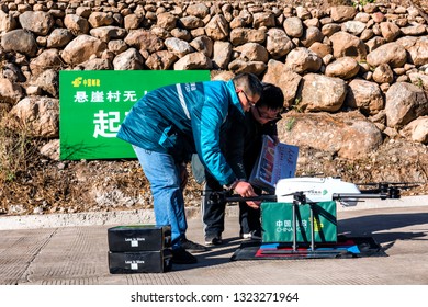 Aba, Sichuan / China - September 20 2018: China Post Has Tested Its Drone Delivery Project In Sichuan Rural Area, Where It Is Warmly Welcomed By A Group Of Kids Under Poverty Line. 