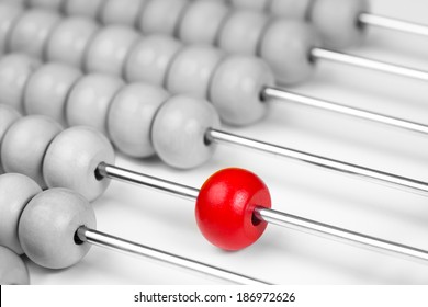 Abacus red bead closeup. Leadership concept.