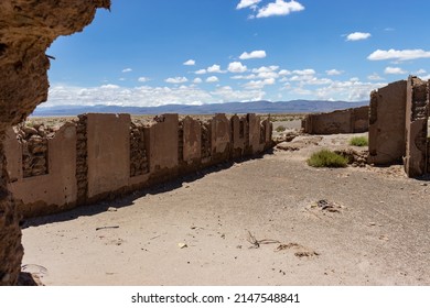 Abadonated building ruins in the Salt desert of Argentina. Adobe buildings in ruins.