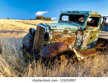 Abandon For Years And Old Trucks Rusts On A Farm