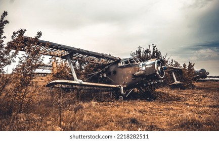 Abandoned Airplane On The Airfield