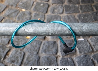 Abandoned Bike Lock Left At A Metallic Fence. Bike Stolen.