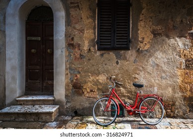 Abandoned Bike On The Italian Street In The Old Tuscany