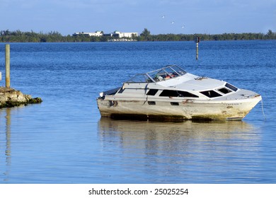 Abandoned Boat Near Land By St Lucie Inlet In Florida