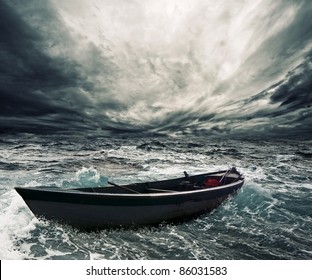 Abandoned boat in stormy sea
