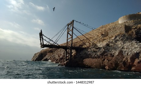 Abandoned bridge in Paracas National Reservation, Islas Ballestas. It's natural habitat to many species of birds.  - Shutterstock ID 1448312987