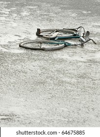 Abandoned, Broken Bicycle On Ice