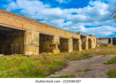 Abandoned Broken Buildings Made Of Concrete Blocks, Hangars