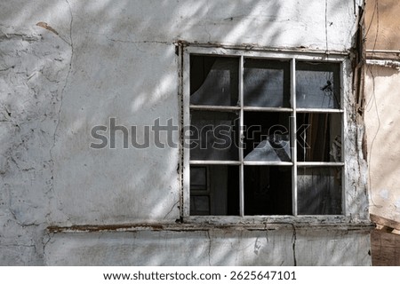 Abandoned building, broken window, decay, ghetto district, urban decay