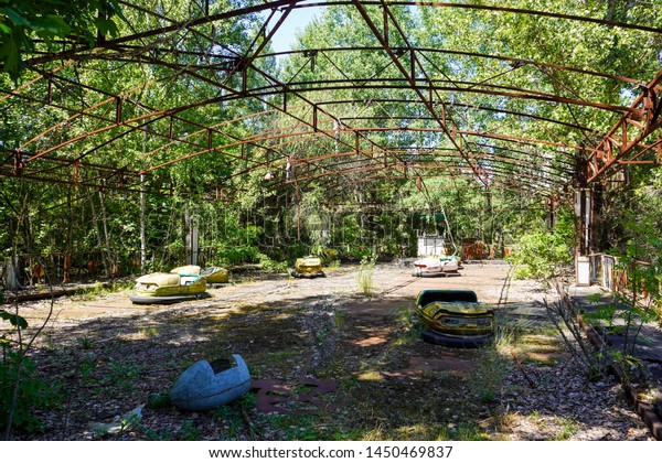 Abandoned bumper\
cars in an amusement park in Pripyat, Ukraine evacuated after the\
Chernobyl nuclear\
accident