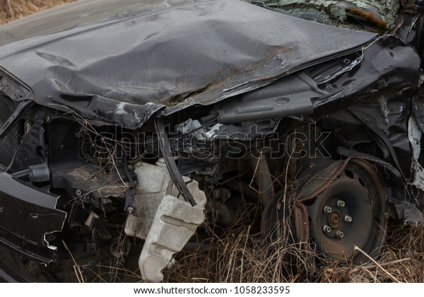 Abandoned car\
after the accident. A broken car, a head-on collision, a deformed\
body. Consequences of an automobile accident. Broken after an\
accident, airbag, broken\
windshield