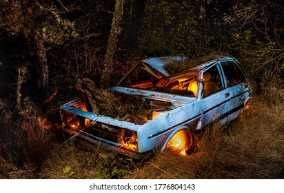 
Abandoned Car In The Field At Night