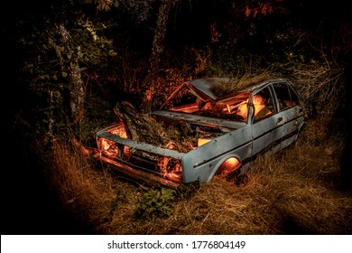 
Abandoned Car In The Field At Night