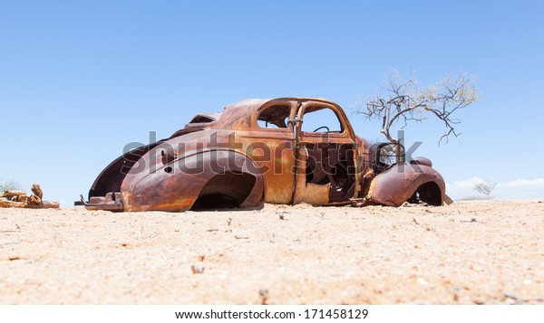 Abandoned car in the\
Namib Desert, Namibia