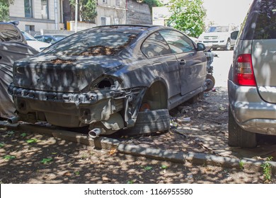  Abandoned Car On A City Street