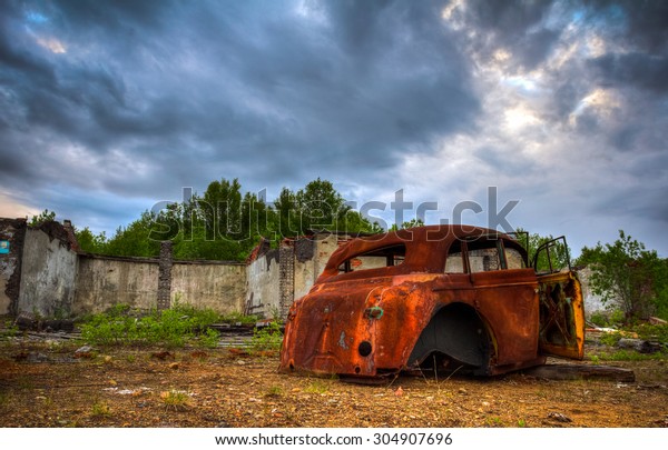 Abandoned car.Old retro\
car at the junkyard