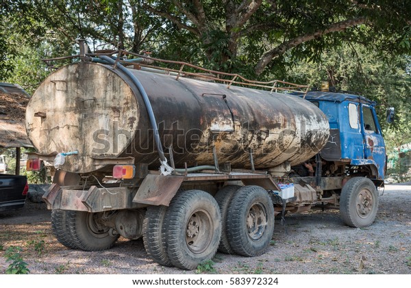 Abandoned car\
tank. Petrol Trucks with rust chrome tank.  car and fuel or gas\
tanker truck side view. transport\
loads
