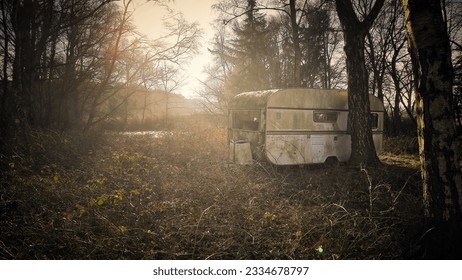 A abandoned caravan in the woods 